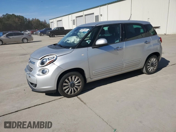 2014 FIAT 500L Easy with VIN ZFBCFABH8EZ000709, listed as a Copart auction lot 82097694 with 72,984 mi miles and Salvage title. Bid and sale history available at DreamBid. Image 1.
