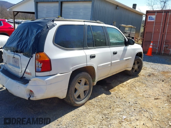 2004 GMC Envoy SLE with VIN 1GKDT13S442223832, listed as a IAAI auction lot 41845628 with 265,898 mi miles. Bid and sale history available at carsss.com. Image 4.