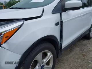 2014 Ford Escape SE with VIN 1FMCU9GX4EUE32062, listed as a IAAI auction lot 42710911 with 68,201 mi miles and . Bid and sale history available at DreamBid. Image 15.