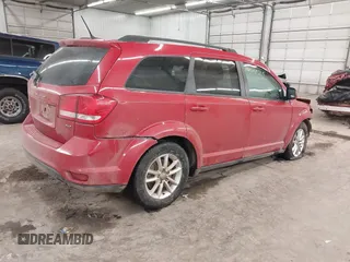 2014 Dodge Journey SXT with VIN 3C4PDCBG2ET188822, listed as a IAAI auction lot 41219215 with 174,053 mi miles. Bid and sale history available at carsss.com. Image 4.