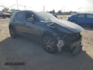 2017 Mazda CX-3 Touring z VIN JM1DKDC77H0151148, wystawiony jako Copart lot #81897434 z przebiegiem Nie podano mil oraz Szkoda całkowita • Salvage title. Historia ofert i sprzedaży dostępna na DreamBid. Obrazek 4.