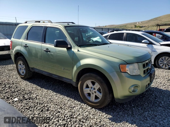 2009 Ford Escape Hybrid with VIN 1FMCU59319KA06852, listed as a Copart auction lot 61405975 with 273,931 mi miles and Salvage title. Bid and sale history available at DreamBid. Image 4.