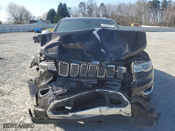 2017 Jeep Grand Cherokee Overland with VIN 1C4RJECG2HC712823, listed as a Copart auction lot 48063325 with 124,812 mi miles and Salvage Title. Bid and sale history available at carsss.com. Image 5.