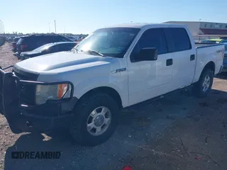 2014 Ford F-150 XL with VIN 1FTFW1EF9EKF06661, listed as a IAAI auction lot 42235635 with 327,584 mi miles and . Bid and sale history available at DreamBid. Image 2.