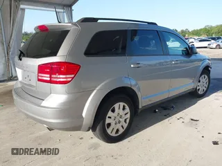 2020 Dodge Journey SE Value with VIN 3C4PDCAB7LT261203, listed as a IAAI auction lot 41963451 with 69,612 mi miles and . Bid and sale history available at carsss.com. Image 4.