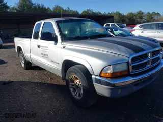 2004 Dodge Dakota SLT with VIN 1D7GL42K94S676958, listed as a IAAI auction lot 41326166 with 176,886 mi miles. Bid and sale history available at carsss.com. Image 1.
