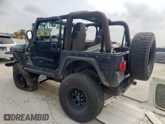 2005 Jeep Wrangler X with VIN 1J4FA39S25P367360, listed as a Copart auction lot 57504365 with 112,125 mi miles and Salvage title. Bid and sale history available at DreamBid. Image 2.