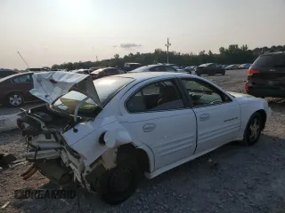 2000 Pontiac Grand Am SE1 with VIN 1G2NF52T6YC525801, listed as a Copart auction lot 59334335 with Not provided miles and Salvage title. Bid and sale history available at DreamBid. Image 3.