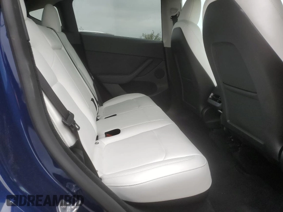 2024 Tesla Model Y with VIN 7SAYGDED3RF118546, listed as a Copart auction lot 56573375 with 4,760 mi miles and Salvage title. Bid and sale history available at DreamBid. Image 10.