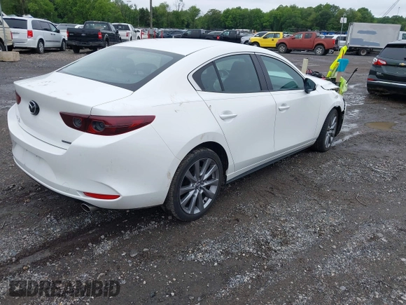2021 Mazda 3 Preferred z VIN 3MZBPBCL0MM250862, wystawiony jako IAAI lot #42318612 z przebiegiem 86 056 mil mil oraz . Historia ofert i sprzedaży dostępna na DreamBid. Obrazek 4.