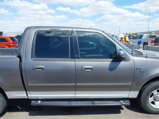 2002 Ford F-150 XLT with VIN 1FTRW07L22KB41794, listed as a IAAI auction lot 42072478 with 116,252 mi miles and . Bid and sale history available at DreamBid. Image 13.