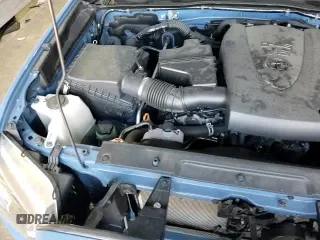 2019 Toyota Tacoma SR z VIN 3TMCZ5AN6KM208944, wystawiony jako Copart lot #70105205 z przebiegiem 29 831 mil mil oraz Szkoda całkowita • Salvage title. Historia ofert i sprzedaży dostępna na DreamBid. Obrazek 13.