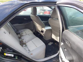 2014 Toyota Camry L with VIN 4T4BF1FK7ER395057, listed as a IAAI auction lot 42215441 with 166,247 mi miles and . Bid and sale history available at DreamBid. Image 8.