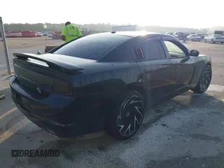 2013 Dodge Charger SE with VIN 2C3CDXBG5DH535058, listed as a IAAI auction lot 42101566 with 205,790 mi miles and . Bid and sale history available at DreamBid. Image 4.