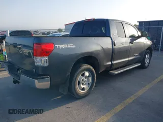 2007 Toyota Tundra SR5 with VIN 5TFRT54117X006566, listed as a IAAI auction lot 42074633 with 277,024 mi miles and . Bid and sale history available at DreamBid. Image 4.
