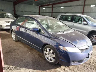 2009 Honda Civic Sdn LX with VIN 2HGFA16559H544472, listed as a IAAI auction lot 41695513 with 124,845 mi miles. Bid and sale history available at carsss.com. Image 1.