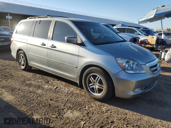 2007 Honda Odyssey Touring with VIN 5FNRL38857B044453, listed as a Copart auction lot 70323773 with 194,831 mi miles and Clean Title. Bid and sale history available at DreamBid. Image 4.