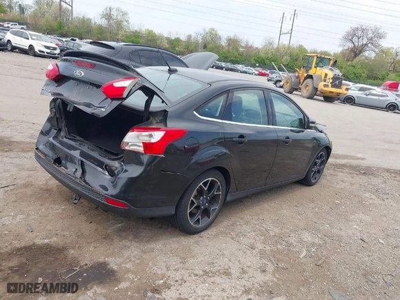 2012 Ford Focus Titanium with VIN 1FAHP3J2XCL369554, listed as a IAAI auction lot 42072931 with 95,474 mi miles. Bid and sale history available at carsss.com. Image 4.
