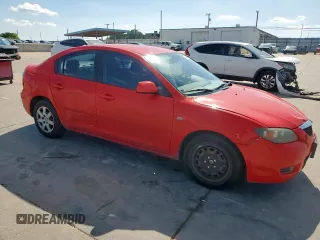 2007 Mazda 3 i Touring with VIN JM1BK12F371718303, listed as a Copart auction lot 54241175 with 197,175 mi miles and Salvage Title. Bid and sale history available at DreamBid. Image 4.