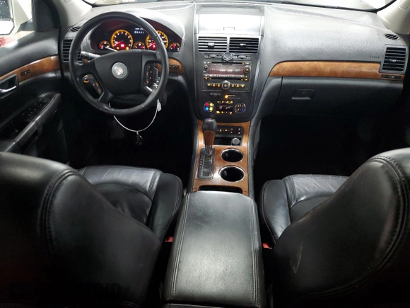 2010 Saturn Outlook XR-L Premium z VIN 5GZLVWED2AJ201356, wystawiony jako Copart lot #70814754 z przebiegiem 226 859 mil mil oraz Szkoda całkowita • Salvage title. Historia ofert i sprzedaży dostępna na DreamBid. Obrazek 8.
