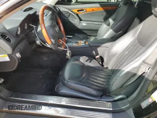 2011 Mercedes-Benz SL 550 with VIN WDBSK7BA6BF161579, listed as a Copart auction lot 78784594 with 112,536 mi miles and Salvage title. Bid and sale history available at DreamBid. Image 7.