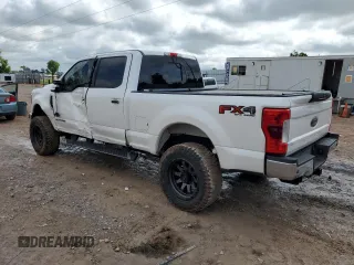 2017 Ford F-250 Lariat z VIN 1FT7W2BT2HEC77098, wystawiony jako Copart lot #57896595 z przebiegiem 142 254 mil mil oraz Szkoda całkowita • Salvage title. Historia ofert i sprzedaży dostępna na DreamBid. Obrazek 2.