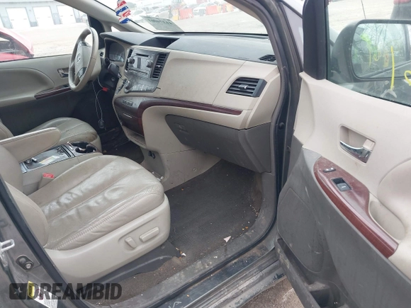 2012 Toyota Sienna XLE AAS with VIN 5TDYK3DCXCS206978, listed as a IAAI auction lot 41374061 with 307,827 mi miles and . Bid and sale history available at DreamBid. Image 5.
