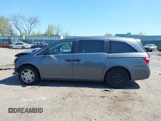 2013 Honda Odyssey LX with VIN 5FNRL5H23DB056331, listed as a IAAI auction lot 42069564 with Not Provided miles and . Bid and sale history available at carsss.com. Image 13.