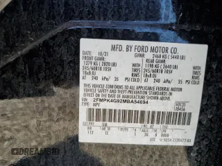2021 Ford Edge SE with VIN 2FMPK4G92MBA54694, listed as a Copart auction lot 49050974 with 95,920 mi miles and Salvage title. Bid and sale history available at DreamBid. Image 12.