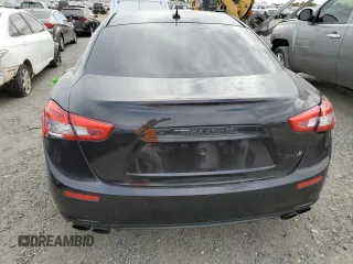 2015 Maserati Ghibli with VIN ZAM57XSA5F1149616, listed as a Copart auction lot 71738433 with 82,300 mi miles. Bid and sale history available at carsss.com. Image 6.