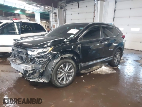 2020 Honda CR-V Touring with VIN 2HKRW2H94LH663650, listed as a IAAI auction lot 41570549 with 29,571 mi miles and . Bid and sale history available at DreamBid. Image 17.