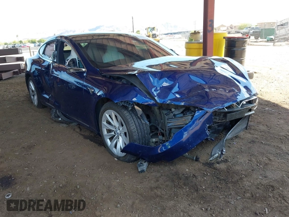 2017 Tesla Model S 100D z VIN 5YJSA1E21HF190815, wystawiony jako IAAI lot #42422004 z przebiegiem 99 938 mil mil oraz . Historia ofert i sprzedaży dostępna na DreamBid. Obrazek 1.