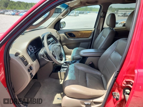 2002 Ford Escape XLT Choice with VIN 1FMYU03132KA78142, listed as a Copart auction lot 65527755 with 149,326 mi miles and Salvage title. Bid and sale history available at DreamBid. Image 7.