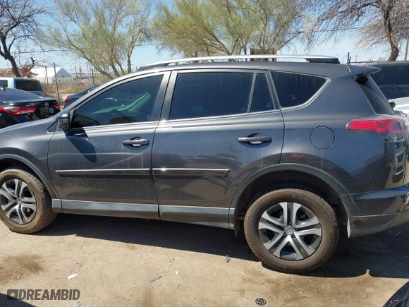2018 Toyota RAV4 LE with VIN JTMZFREV2JJ190085, listed as a IAAI auction lot 41895635 with 54,577 mi miles. Bid and sale history available at carsss.com. Image 14.