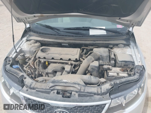 2012 Kia Forte EX with VIN KNAFU4A25C5591601, listed as a IAAI auction lot 42071351 with 120,636 mi miles. Bid and sale history available at carsss.com. Image 10.