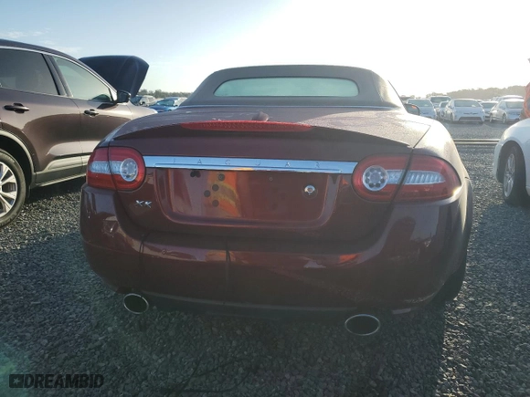 2010 Jaguar XK with VIN SAJWA4GB5ALB36814, listed as a Copart auction lot 74855444 with 0 mi miles and Salvage Title. Bid and sale history available at carsss.com. Image 6.