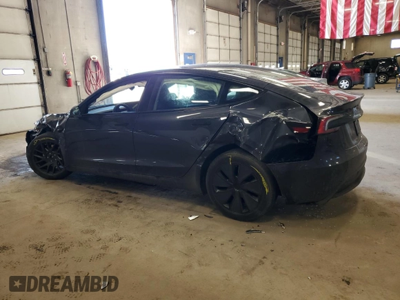 2024 Tesla Model 3 Long Range with VIN 5YJ3E1EBXRF818977, listed as a Copart auction lot 47303885 with 14,189 mi miles and Salvage Title. Bid and sale history available at DreamBid. Image 2.