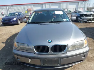2003 BMW 3 Series 330xi with VIN WBAEW534X3PN31070, listed as a IAAI auction lot 41776406 with 176,383 mi miles. Bid and sale history available at carsss.com. Image 6.