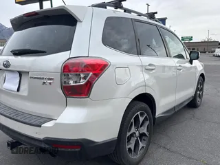 2014 Subaru Forester 2.0XT Premium with VIN JF2SJGDC1EH477436, listed as a Copart auction lot 54798465 with 124,807 mi miles and Clean Title. Bid and sale history available at carsss.com. Image 4.