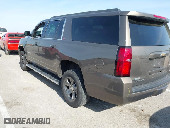 2016 Chevrolet Suburban LT z VIN 1GNSKHKC2GR289761, wystawiony jako IAAI lot #42086912 z przebiegiem 247 791 mil mil oraz . Historia ofert i sprzedaży dostępna na DreamBid. Obrazek 3.