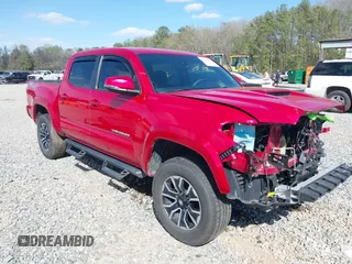 2023 Toyota Tacoma SR with VIN 3TMCZ5AN1PM623709, listed as a IAAI auction lot 41846235 with 36,781 mi miles and . Bid and sale history available at DreamBid. Image 1.