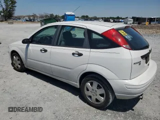 2005 Ford Focus S with VIN 3FAFP37N65R120732, listed as a Copart auction lot 52451995 with 118,612 mi miles and Clean Title. Bid and sale history available at carsss.com. Image 2.