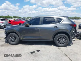 2020 Mazda CX-5 Touring with VIN JM3KFACM9L0826742, listed as a IAAI auction lot 41903755 with 73,409 mi miles and . Bid and sale history available at DreamBid. Image 15.