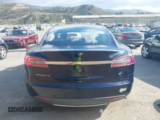 2013 Tesla Model S with VIN 5YJSA1CN8DFP07177, listed as a IAAI auction lot 42127797 with 75,227 mi miles and . Bid and sale history available at DreamBid. Image 17.