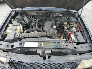 2003 Ford Ranger XL with VIN 1FTYR10U73PB86715, listed as a Copart auction lot 58957385 with 131,775 mi miles and Salvage title. Bid and sale history available at DreamBid. Image 11.