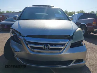 2005 Honda Odyssey EX-L z VIN 5FNRL38715B014905, wystawiony jako IAAI lot #41986395 z przebiegiem 191 029 mil mil oraz . Historia ofert i sprzedaży dostępna na DreamBid. Obrazek 12.