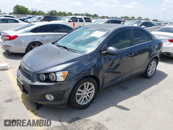 2012 Chevrolet Sonic LT with VIN 1G1JC5SH1C4182616, listed as a IAAI auction lot 42081899 with 92,802 mi miles and . Bid and sale history available at DreamBid. Image 2.