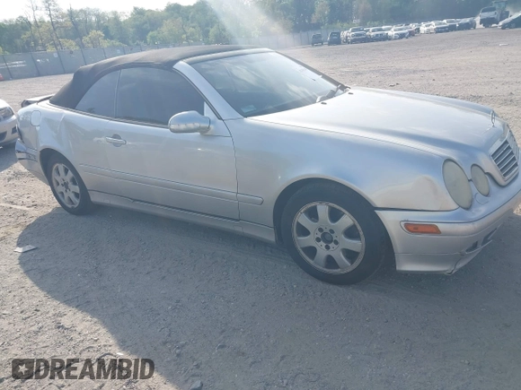 2003 Mercedes-Benz CLK 320 with VIN WDBLK65G23T142769, listed as a IAAI auction lot 42155649 with 106,644 mi miles and . Bid and sale history available at DreamBid. Image 1.