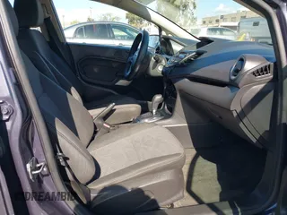 2013 Ford Fiesta SE with VIN 3FADP4EJ8DM221179, listed as a IAAI auction lot 41958070 with 197,454 mi miles. Bid and sale history available at carsss.com. Image 5.