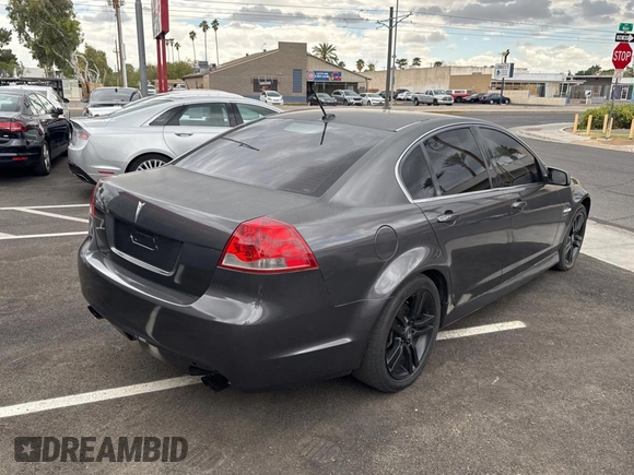 2009 Pontiac G8 with VIN 6G2ER57779L157359, listed as a Copart auction lot 56220095 with 114,020 mi miles and Clean Title. Bid and sale history available at DreamBid. Image 4.